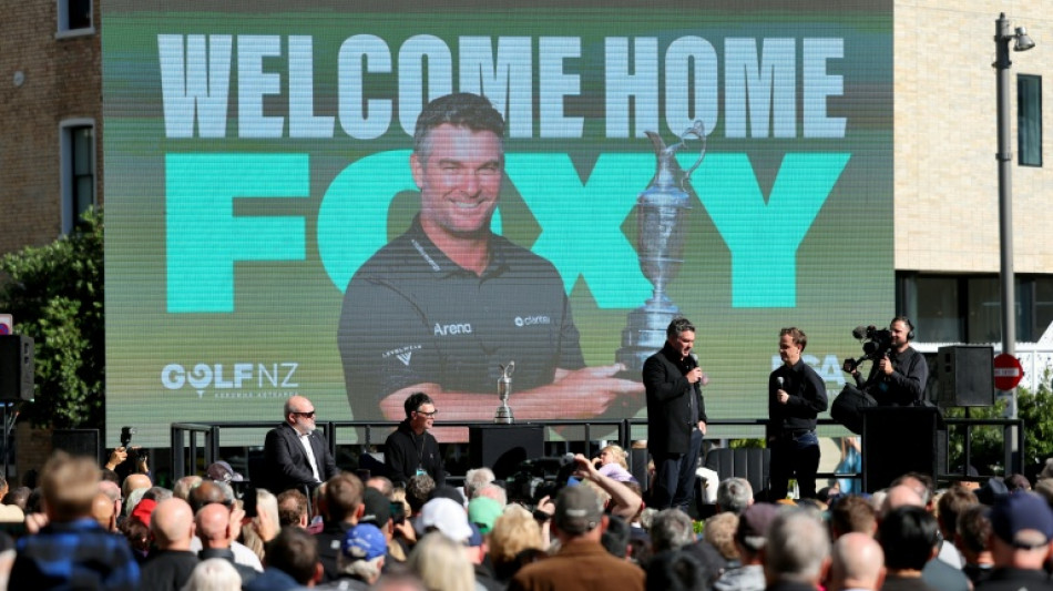 Open champion Fox welcomed home by thousands after 'whirlwind few days'