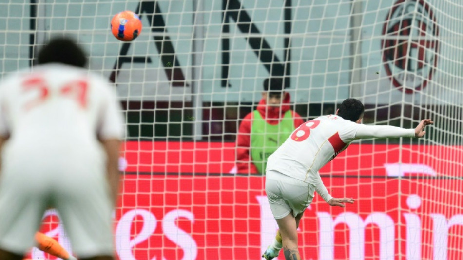 AC Milan scrape a point with Genoa after late penalty howler