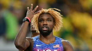 Lyles defies health issues to emulate Bolt's feat