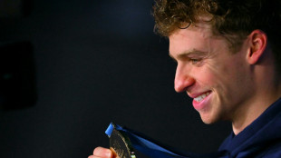 Magic Marchand adds gold to world record as McIntosh wins again