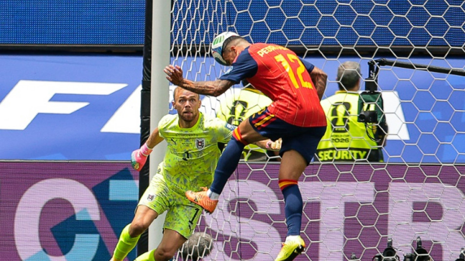 Spain ease past Austria with 3-0 World Cup win