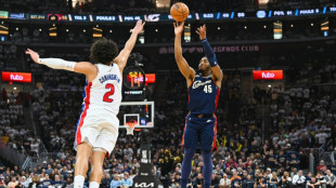 Mitchell magic as Cavs down Pistons to level series