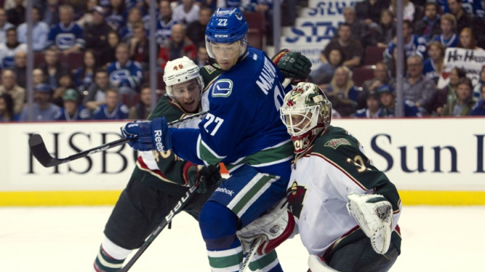 Canucks hire Malhotra as coach after NHL-worst season 