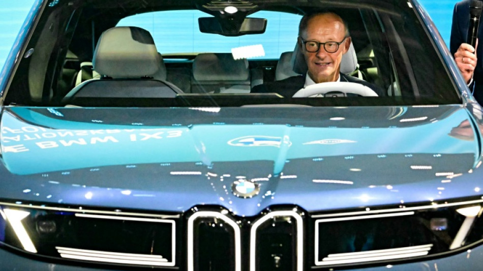 At German auto crisis meet, Merz vows to fight EU gas guzzler ban