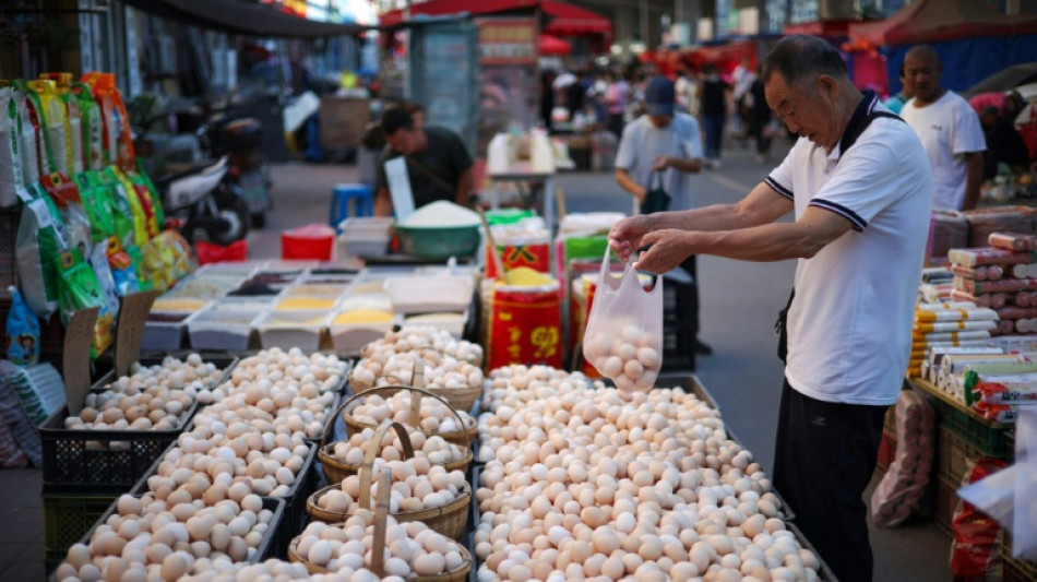 China consumer spending falls as pressure on economy builds