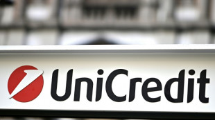 Putin allows Italy's UniCredit to sell part of Russian business