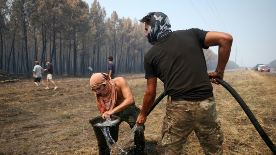 France firefighters hopeful, as Spain reports 'almost no flames'