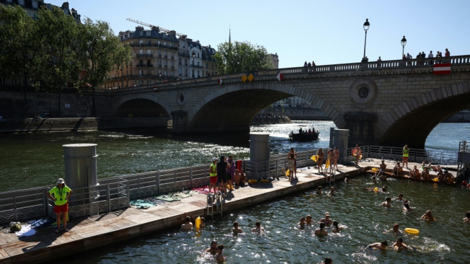Splish-splash! Parisians and tourists soak in the Seine