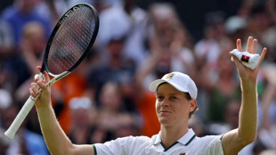 Sinner survives scare and fall to reach Wimbledon second round