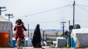 Australia charges woman with terrorism over IS links