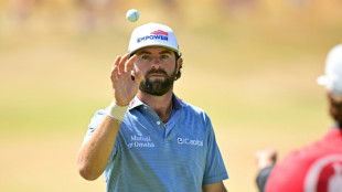 Young charges into British Open lead as Scheffler comes up short