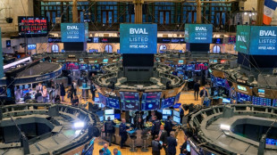 Wall Street termine en baisse, le march&eacute; attendait encore davantage de la Fed