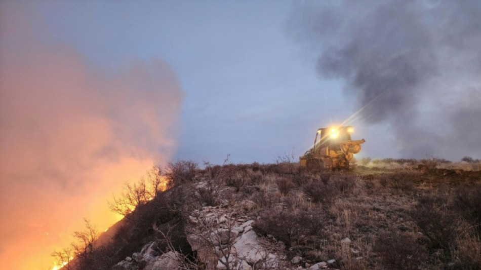 La pluie offre un bref r&eacute;pit face au plus grand incendie de l'histoire du Texas