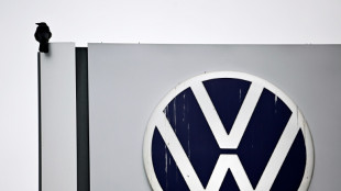Volkswagen profit plunges as carmaker weighs mass job cuts
