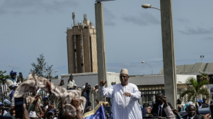 Ex-president Sall back in Senegal for talks with successor