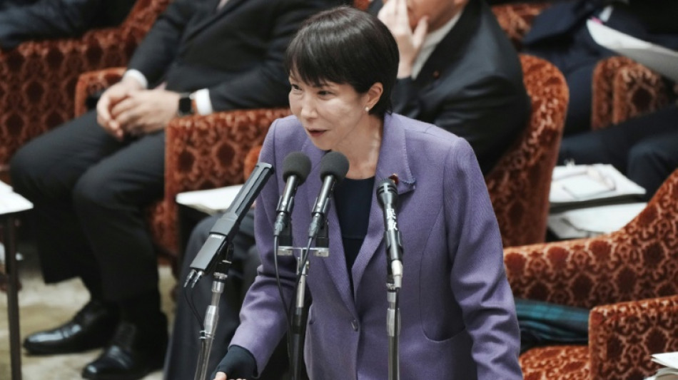 Japan ruling party approves plans to beef up intelligence