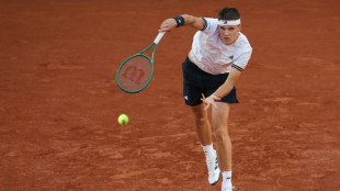 Mensik holds off Rublev to book maiden French Open last-eight spot