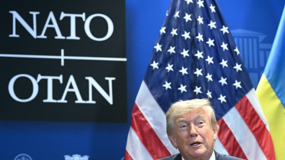 Trump tempers fury to end NATO summit on high note