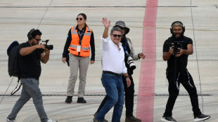Ex-president Hernandez returns to Honduras after Trump pardon