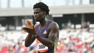 Hurdles record holder Tharp claims first win as professional in Budapest