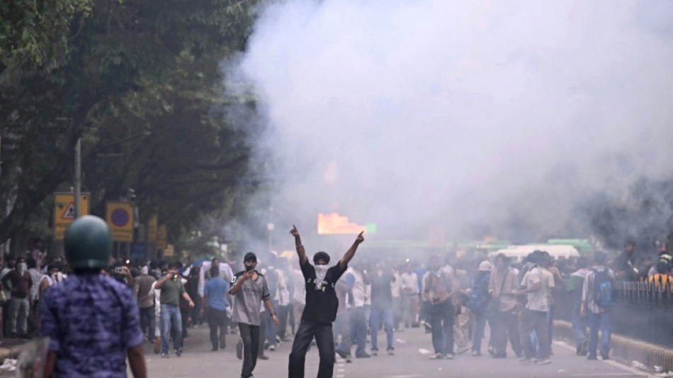 Indian police fire tear gas at exam protest march