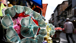 India scrambles to steady rupee as oil shock bites