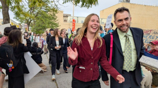 Judge weighs court's powers in Trump climate case