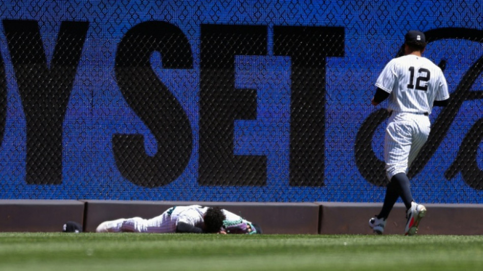 Yankees outfielder Dominguez collides with wall making catch