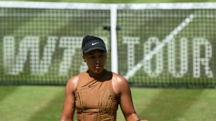 Osaka sinks Wang to reach first grass court final
