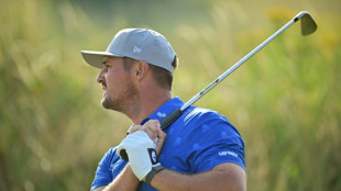 DeChambeau 'fired up' by two-shot penalty as Fox joins 62 club at British Open