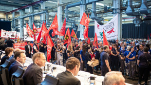 Crisis-hit Volkswagen scraps German job protection deal