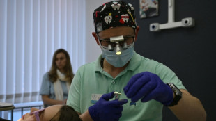 Some Ukrainian refugees head home - for dental work