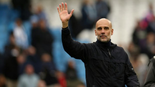 Guardiola says Man City 'still fighting' for Premier League title