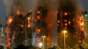 Hong Kong: au moins quatre morts dans l'incendie d'un complexe r&eacute;sidentiel