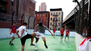 Kicking off: New York football enthusiasts defy pitch shortage