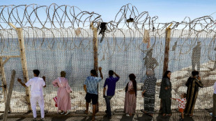 Moroccans gather at Ceuta border, desperate for news of loved ones