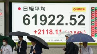 Asian stocks surge on Iran hopes and Samsung deal