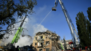 Russian attack kills 14 in Kyiv, including three children