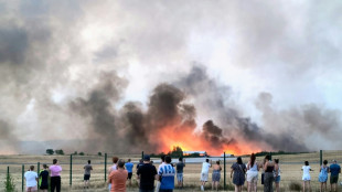 Devastating wildfires send 267,000 fleeing in France and Spain