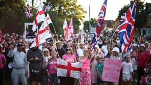 UK govt seeks to overturn ban on housing migrants in hotel