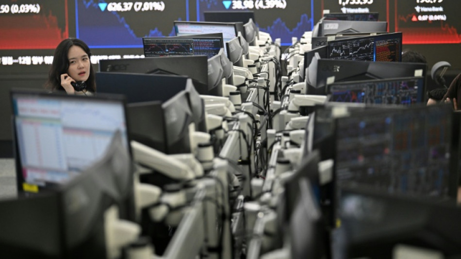 Stock markets diverge as tech recovery stutters
