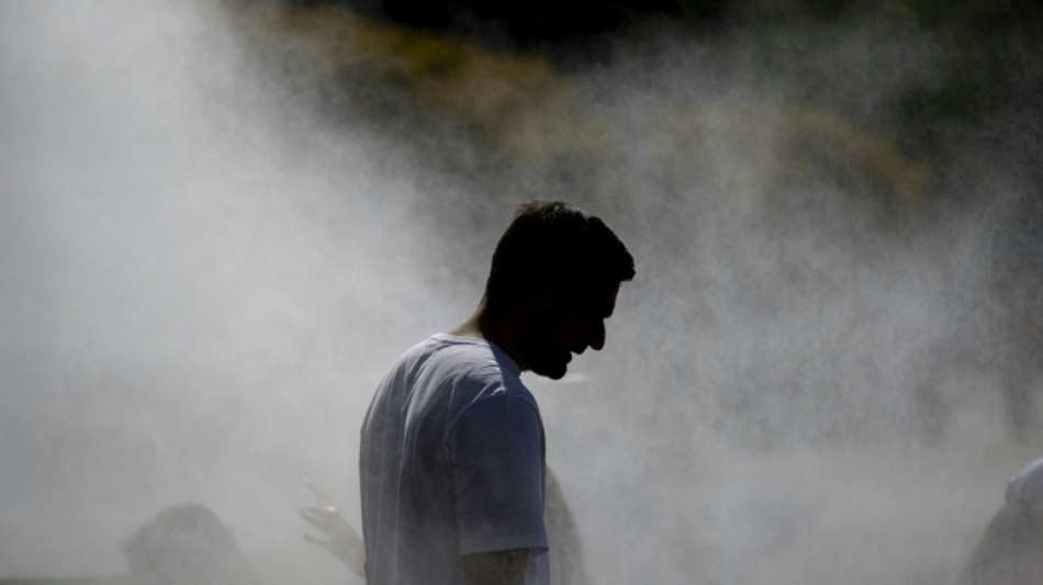 France presses ahead with street music festival despite extreme heat