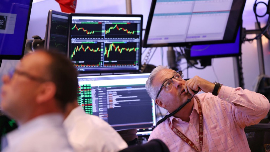 Wall Street termine en baisse, la Fed attendue moins volontariste que pr&eacute;vu