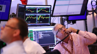 Wall Street termine en baisse, la Fed attendue moins volontariste que pr&eacute;vu