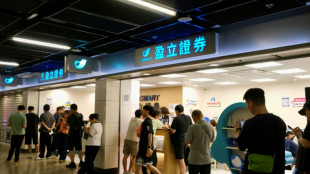 Chinese investors flock to Hong Kong as trading curbs tighten