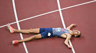 Singing British hurdler Donovan in tune on world debut