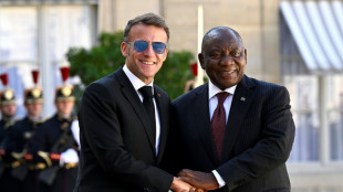 France hosts S.Africa leader for talks, war remembrance