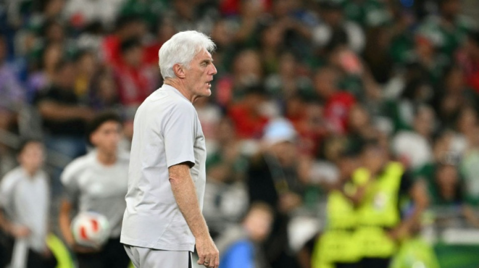 Broos smiles and snarls before South Africa's historic World Cup match