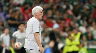 Broos smiles and snarls before South Africa's historic World Cup match