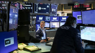 Wall Street termine dans le vert, mais l'incertitude règne